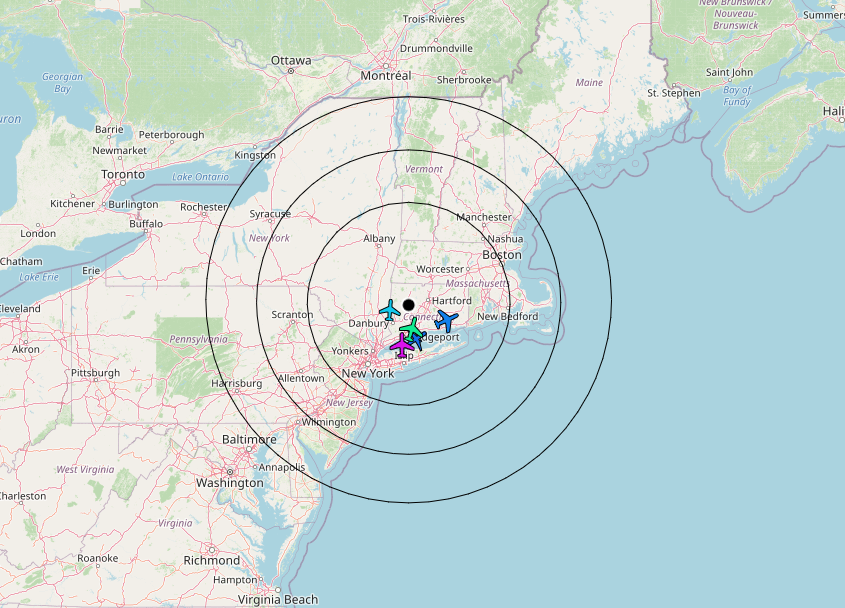 A map of the Northeast United States where the receiver site is marked with a black dot and several concentric rings at different distances. Several aircraft are also displayed on the map.